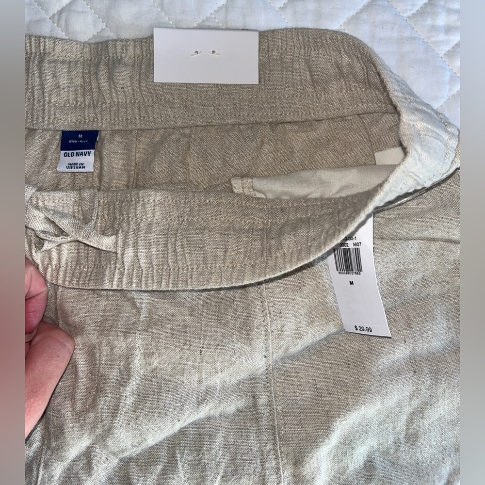 Khaki colored shorts.